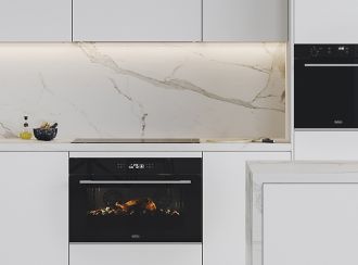 A Black Belling Design oven built into a white kitchen