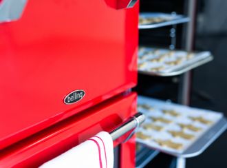 Closeup of the glossy paint finish on a bright red Belling Richmond Range Cooker
