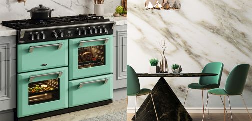 Mojito Mint green coloured range cooker in a kitchen styled with matching green dining chairs